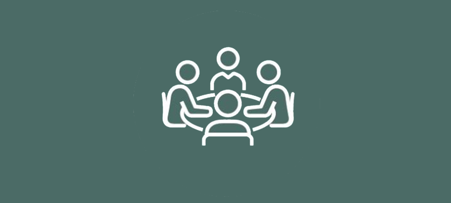 a group of people sitting at a table